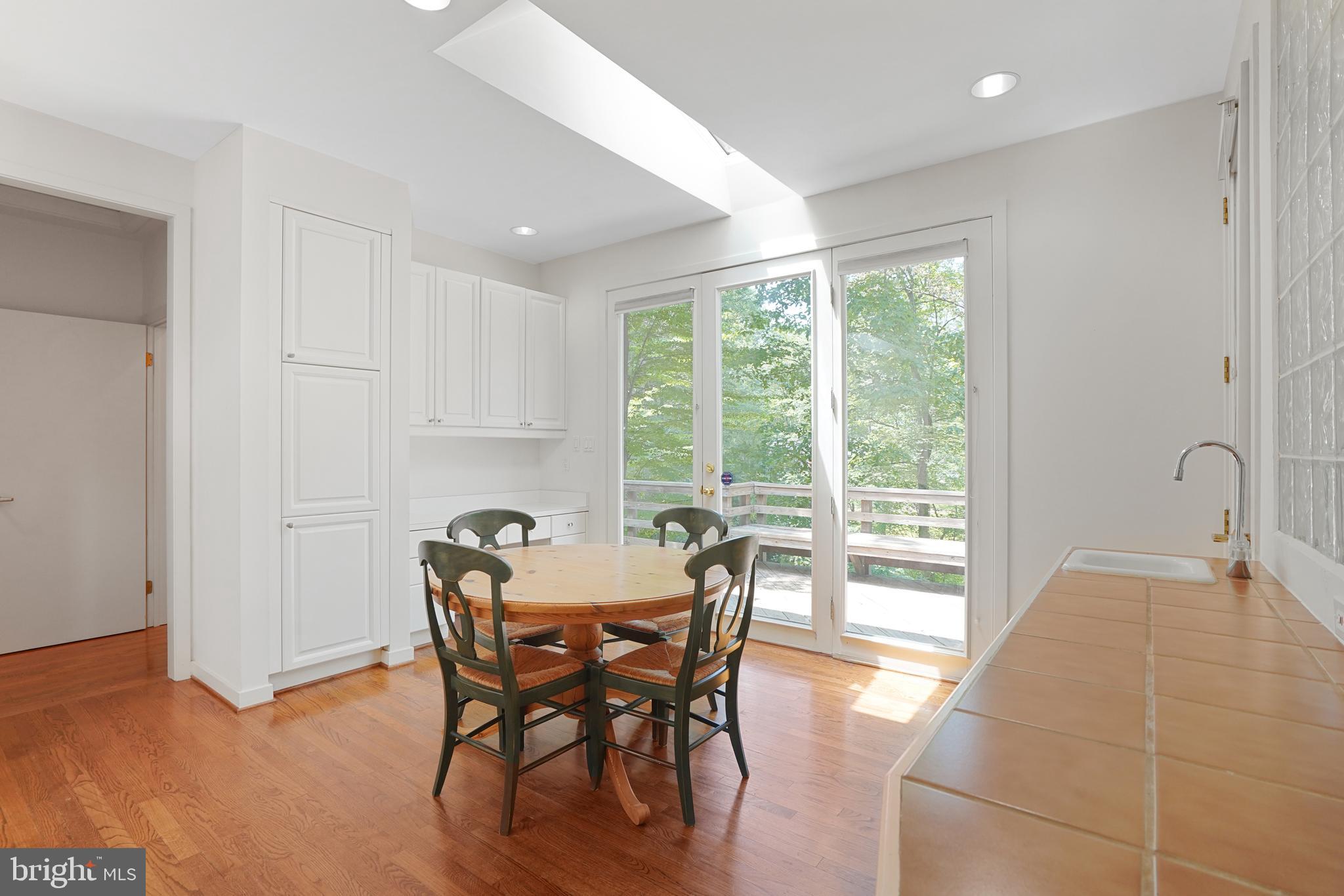 926 Saigon Road McLean, VA 22102 - Photo 22 of 54 Sun-drenched Eat-in Kitchen w/ Upper Deck Access