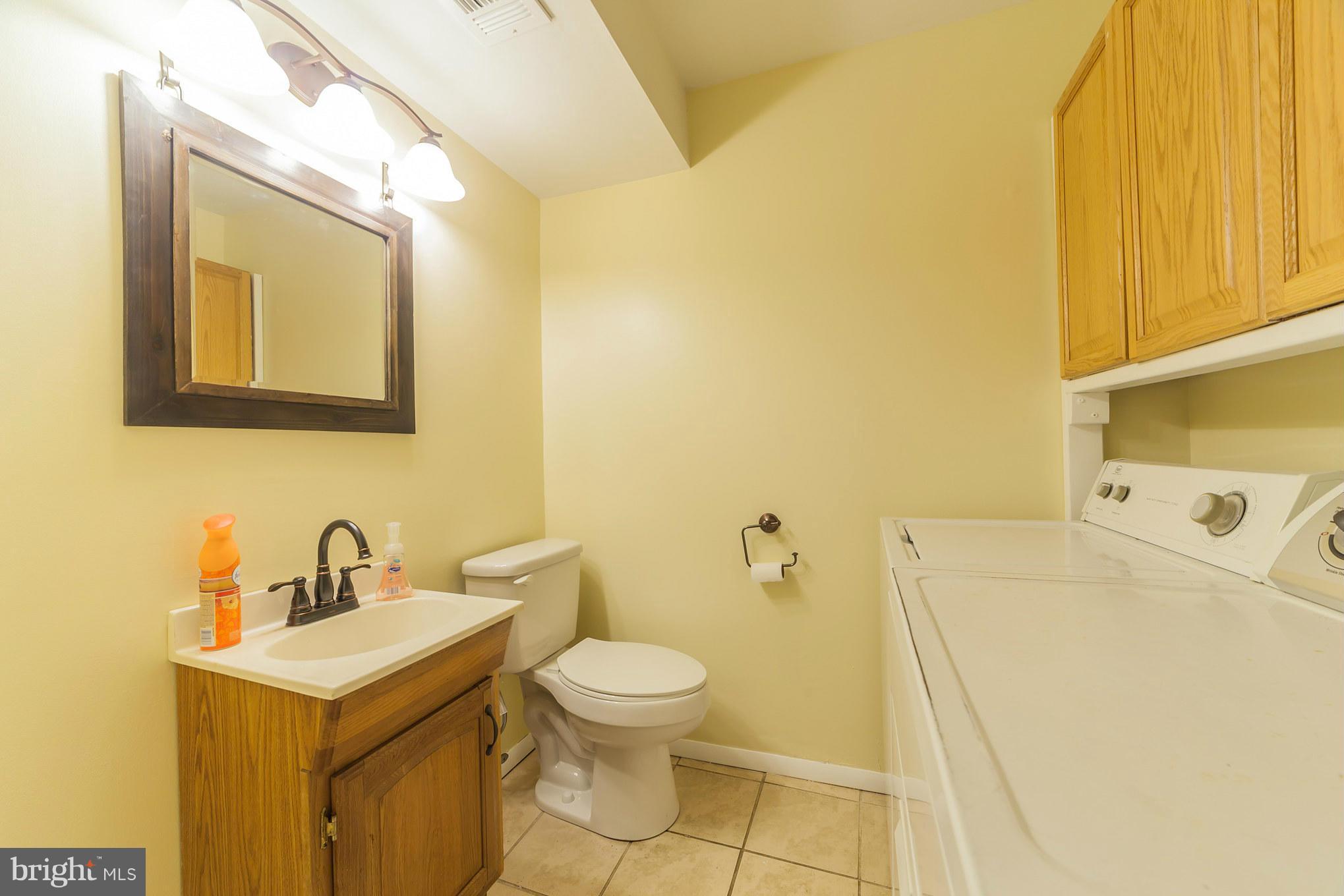 1308 Wickell Road Odenton, MD 21113 - Photo 14 of 30 Powder bath and laundry room on main level