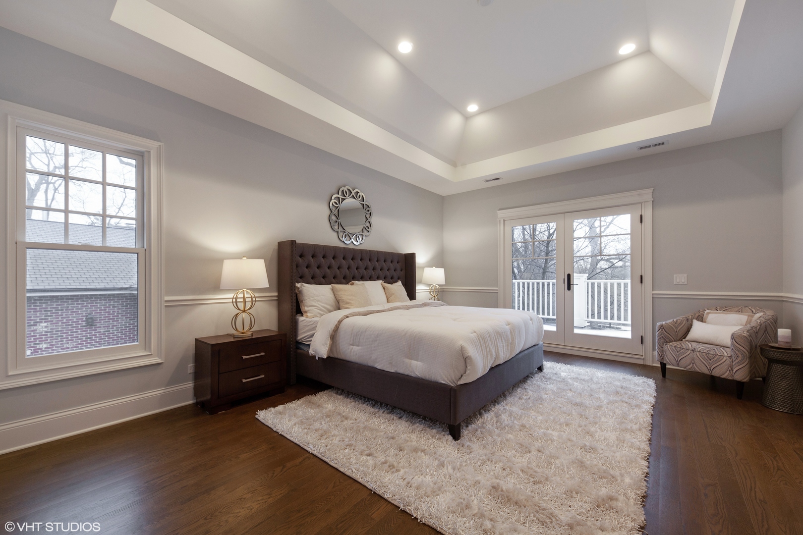 117 Church Road Winnetka, IL 60093 - Photo 18 of 29 a bedroom with a bed and wooden floor
