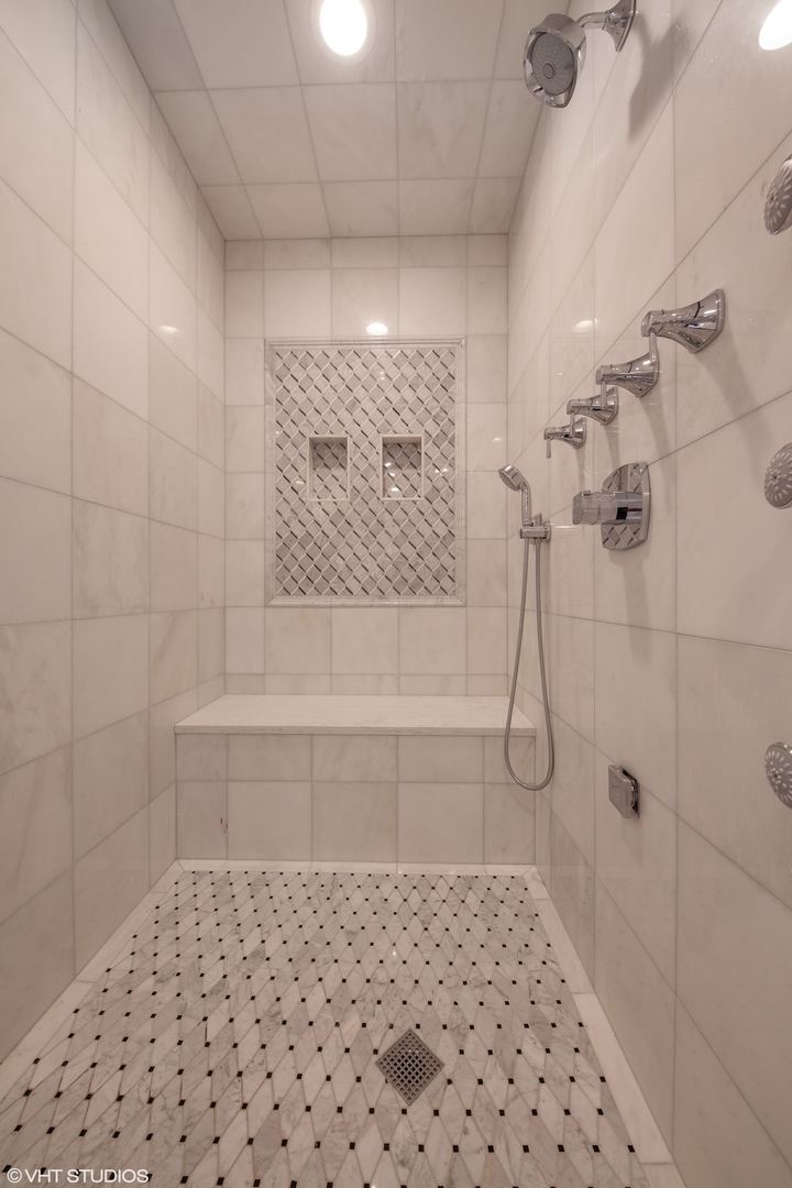 117 Church Road Winnetka, IL 60093 - Photo 19 of 29 a bathroom with a shower