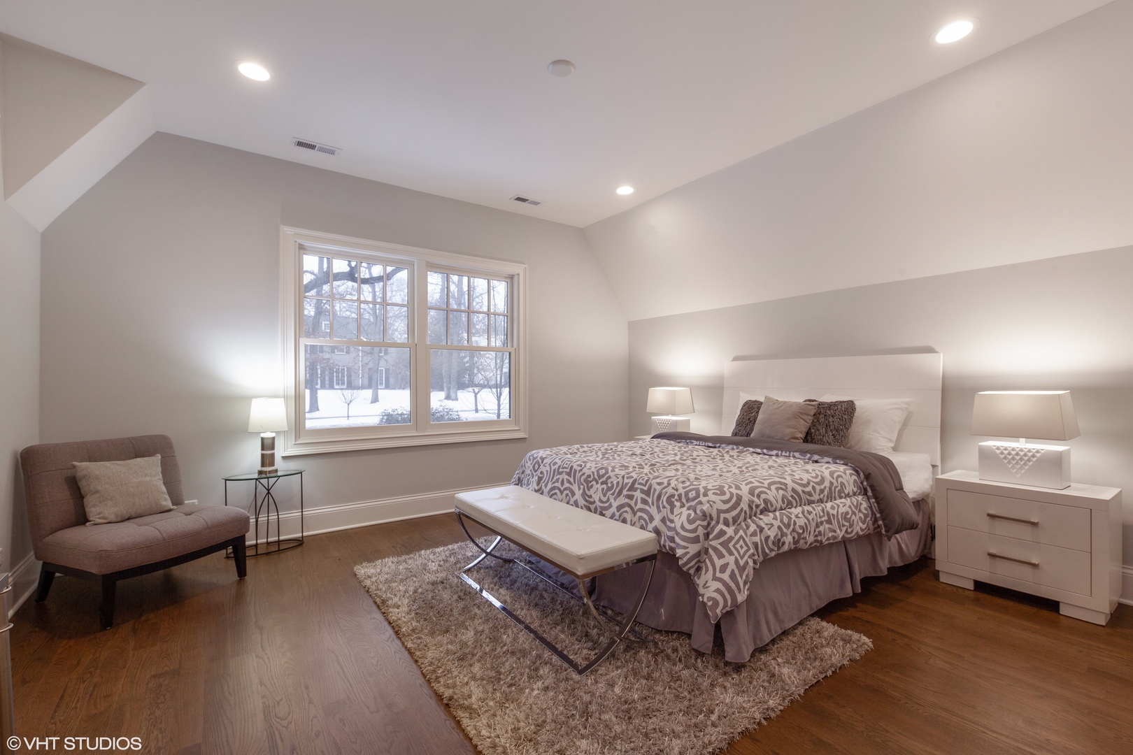 117 Church Road Winnetka, IL 60093 - Photo 21 of 29 a bedroom with a bed and a couch with window
