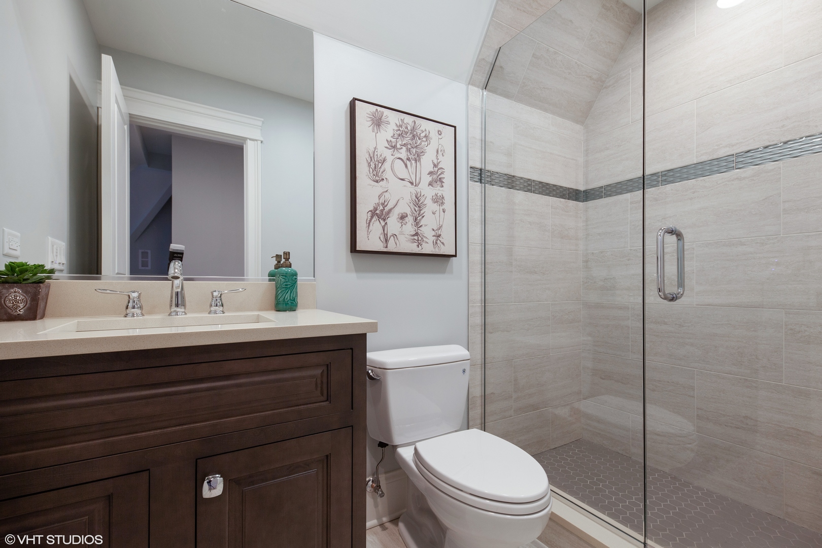 117 Church Road Winnetka, IL 60093 - Photo 24 of 29 a bathroom with a sink a toilet and shower