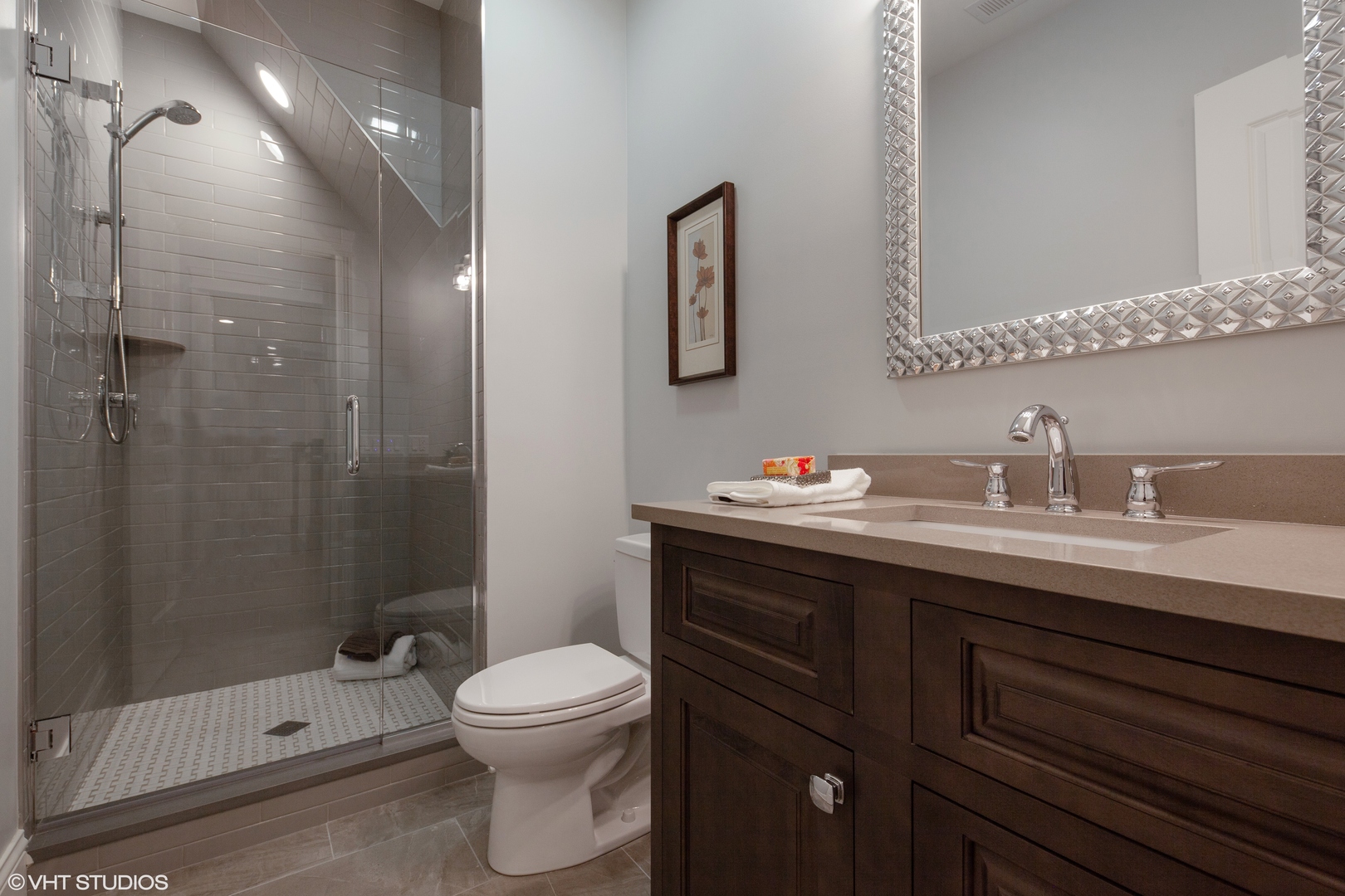 117 Church Road Winnetka, IL 60093 - Photo 25 of 29 a bathroom with a sink a toilet and shower