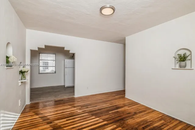 a view of an empty room and window