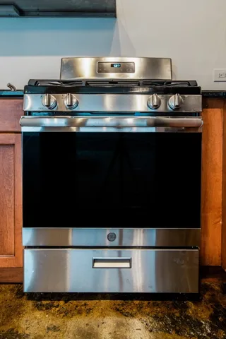 a view of a refrigerator in kitchen island