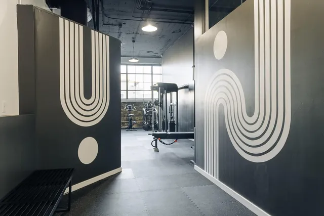 a view of a livingroom with furniture and windows