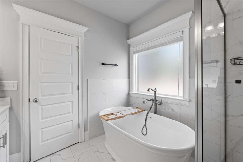 105 Capps Lane Eatonton, GA 31024 - Photo 38 of 65 a bathroom with a sink and a mirror