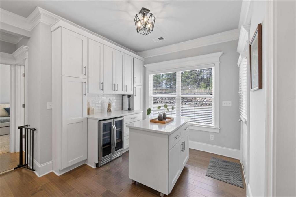 105 Capps Lane Eatonton, GA 31024 - Photo 42 of 65 a kitchen with sink cabinets and window