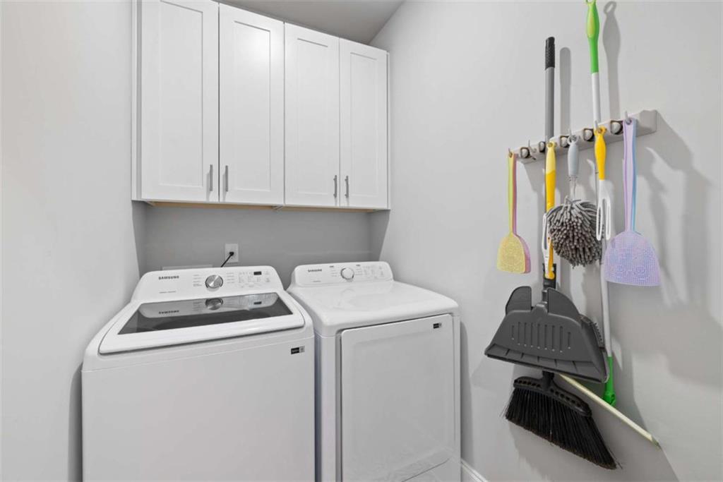105 Capps Lane Eatonton, GA 31024 - Photo 51 of 65 a utility room with dryer and washer