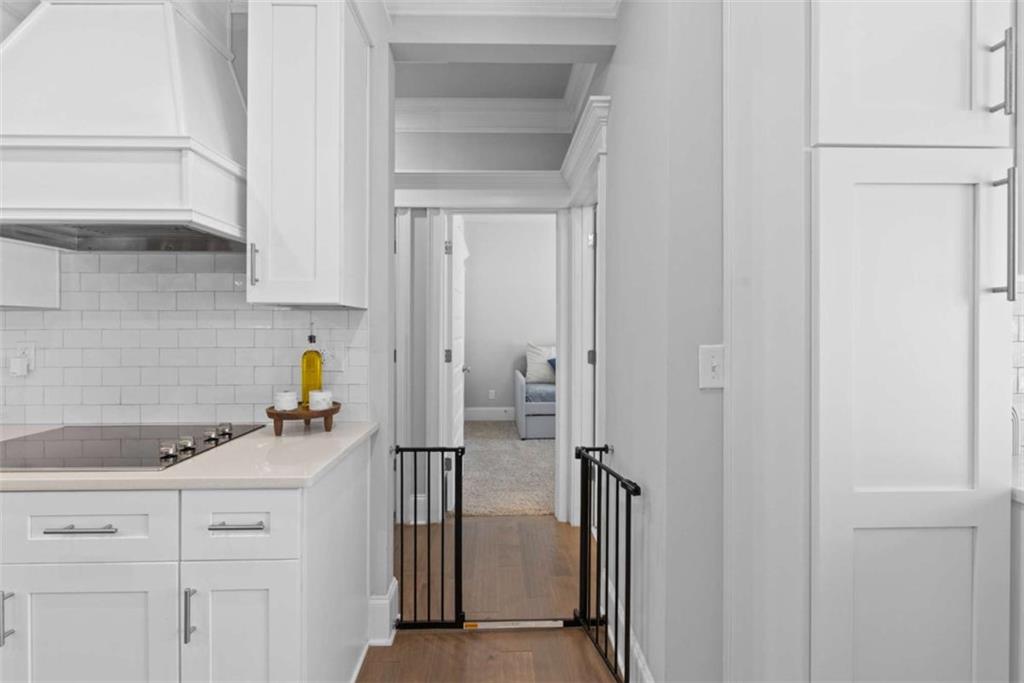 105 Capps Lane Eatonton, GA 31024 - Photo 53 of 65 a kitchen with a refrigerator and cabinets