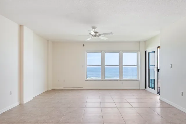 a view of a balcony with a floor to ceiling window