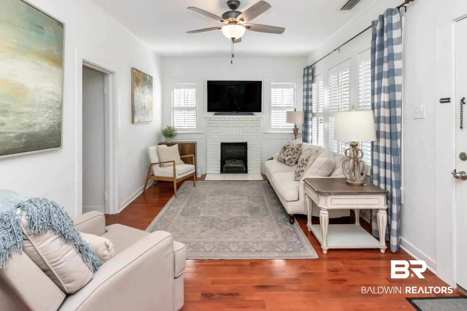 116 Item Avenue Mobile, AL 36607 - Photo 6 of 33 Living room featuring hardwood / wood-style floors, a fireplace, and ceiling fan