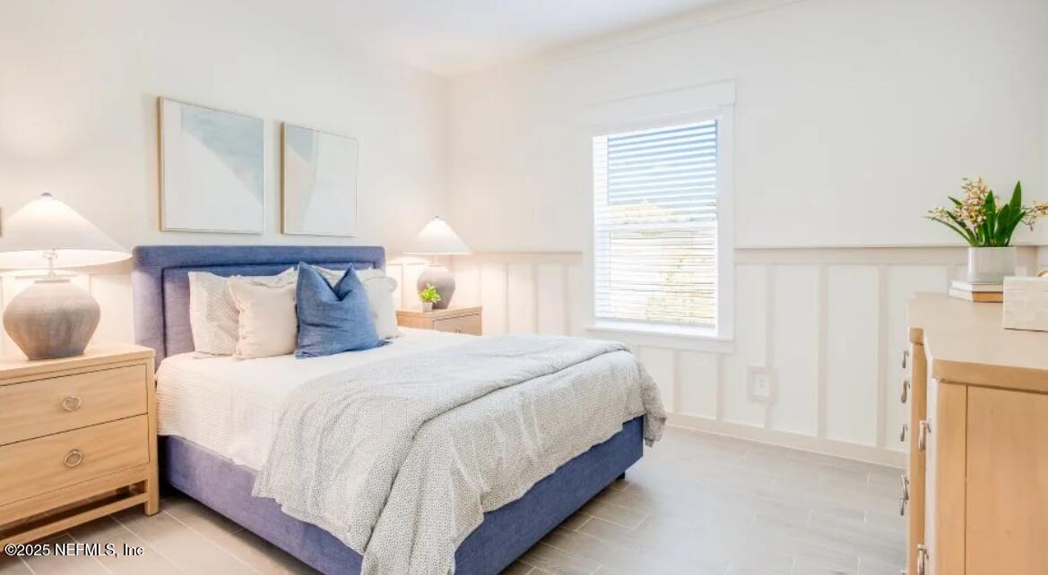 20 Neighbor Court St. Augustine, FL 32092 - Photo 67 of 71 a bedroom with a bed and a potted plant