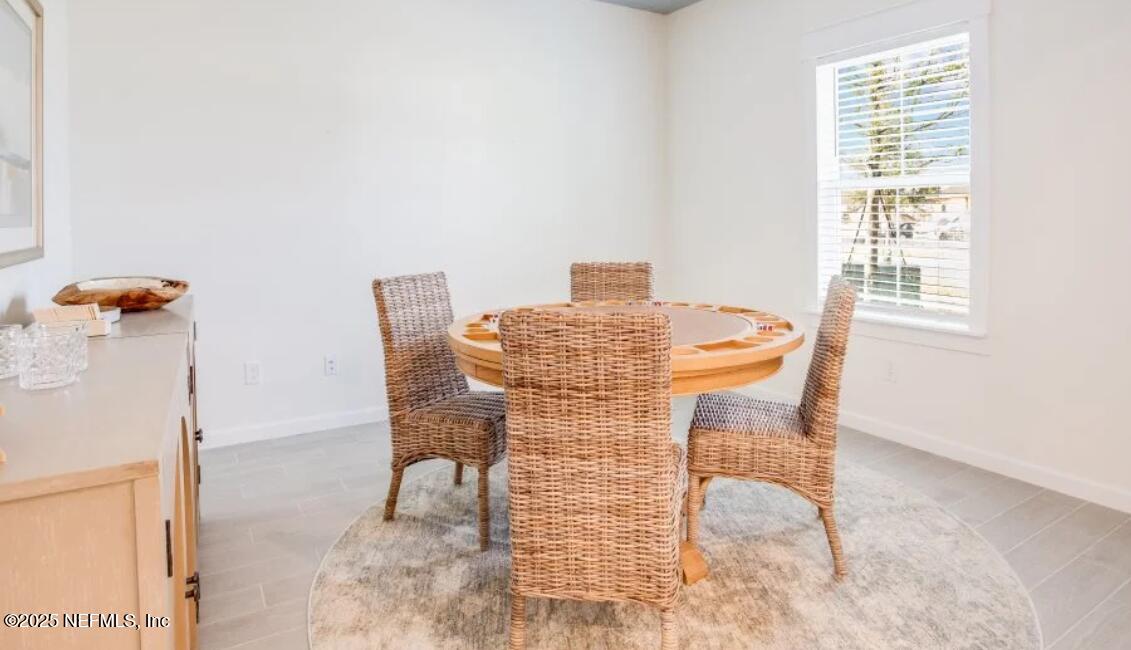 20 Neighbor Court St. Augustine, FL 32092 - Photo 70 of 71 a view of a dining room with furniture and a window