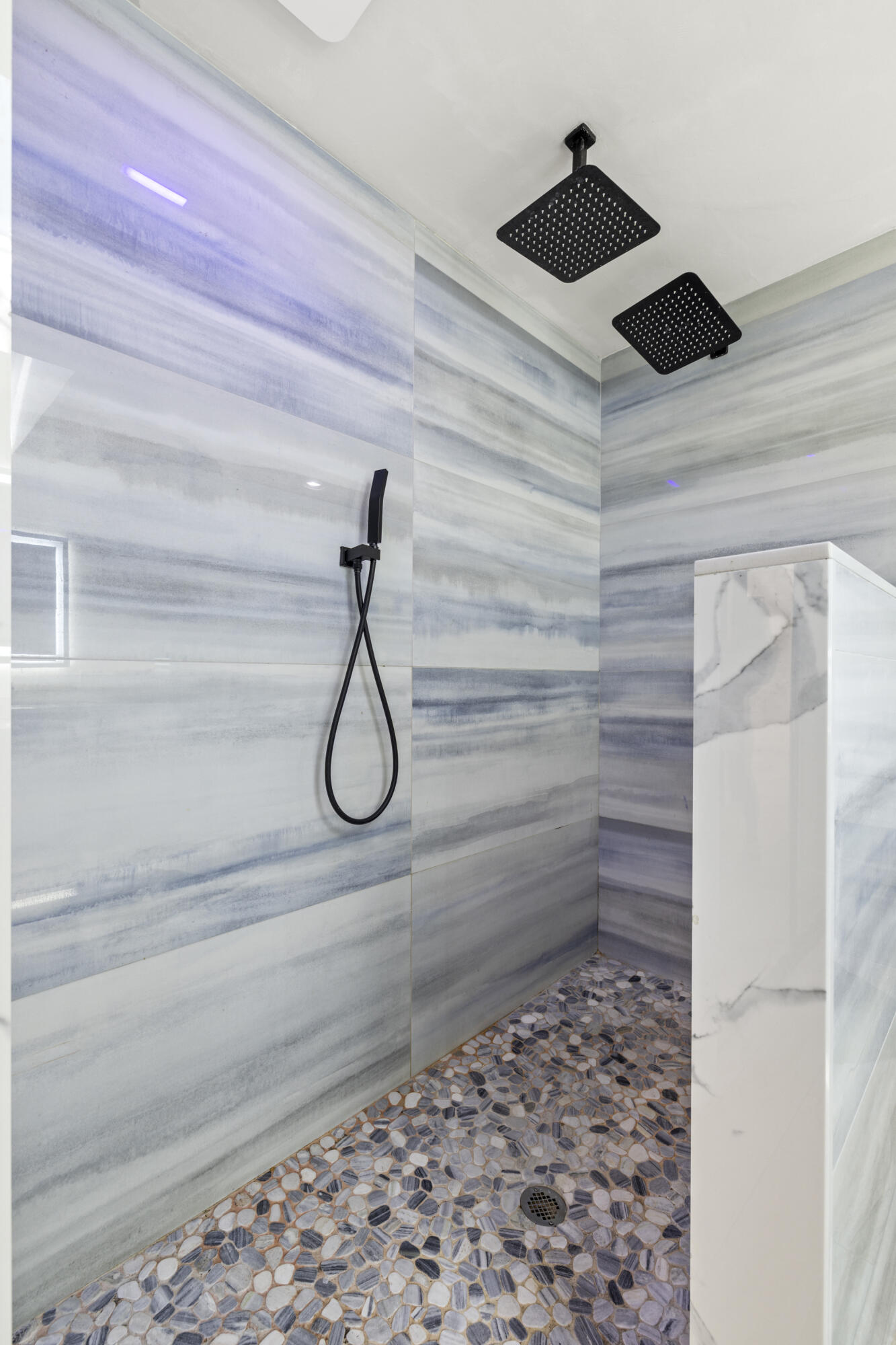 125 Cape Pointe Circle Jupiter, FL 33477 - Photo 13 of 45 a bathroom with a shower