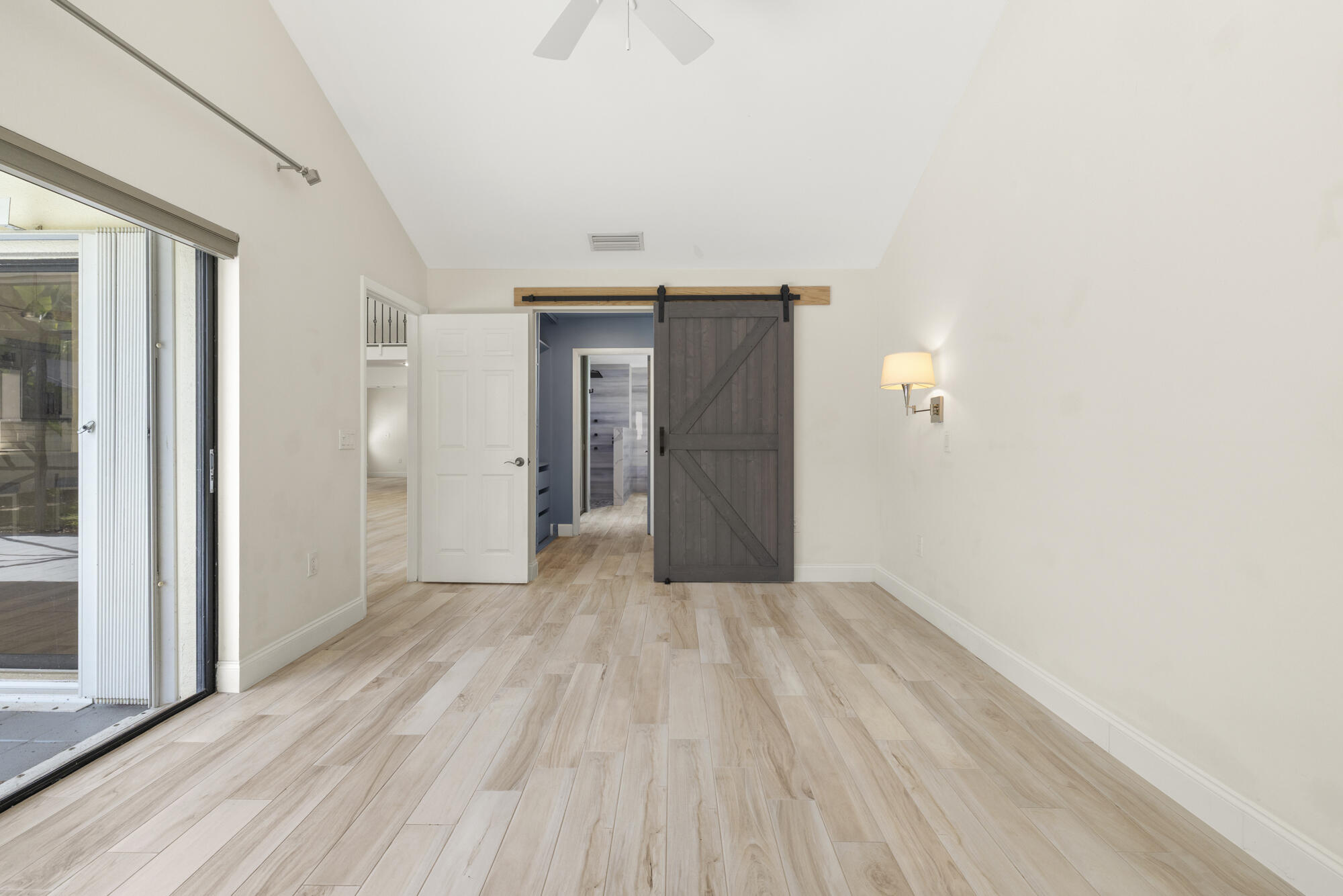 125 Cape Pointe Circle Jupiter, FL 33477 - Photo 15 of 45 a view of hallway with wooden floor