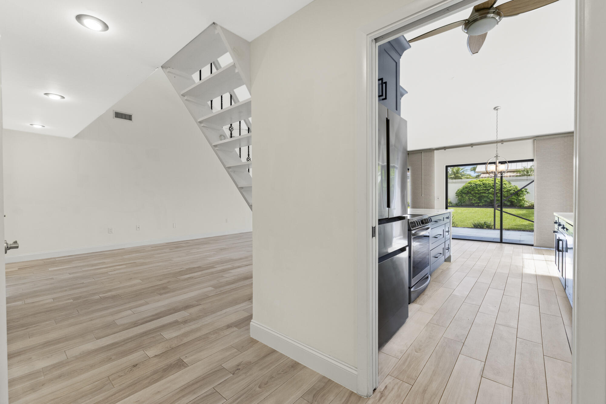 125 Cape Pointe Circle Jupiter, FL 33477 - Photo 17 of 45 a view of a living room with a large window