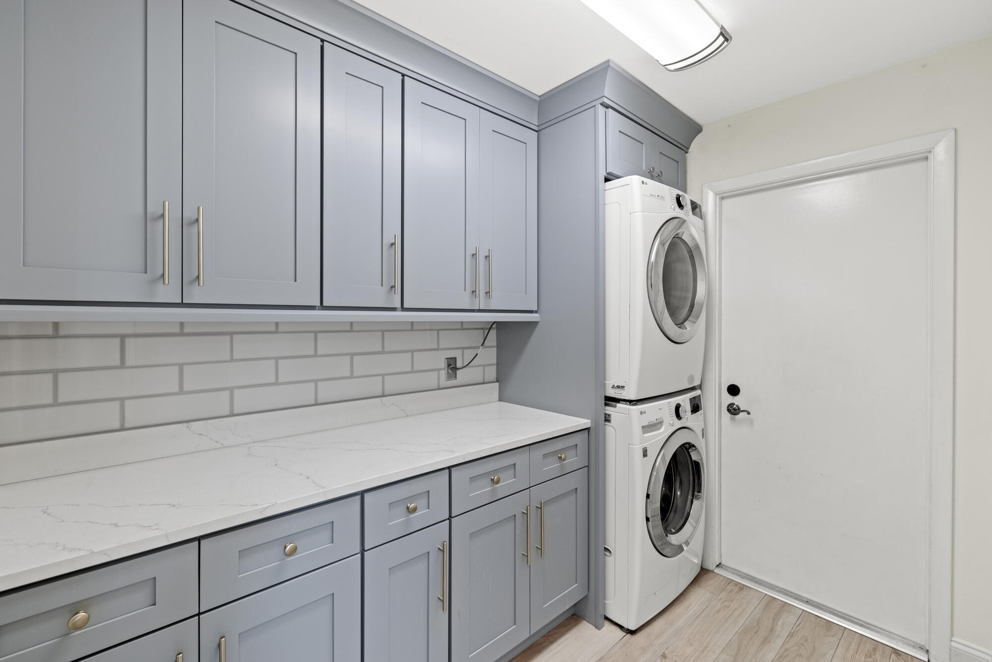 125 Cape Pointe Circle Jupiter, FL 33477 - Photo 23 of 45 a utility room with dryer and washer