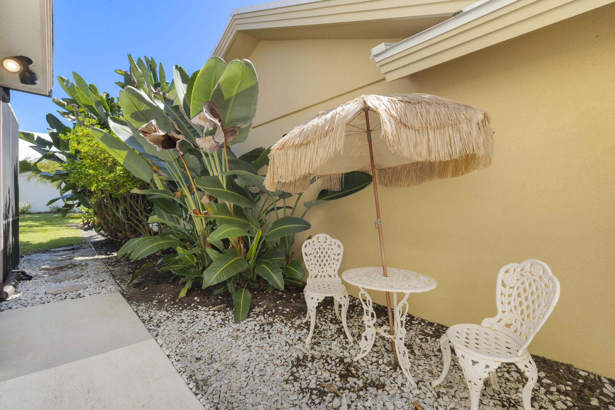 125 Cape Pointe Circle Jupiter, FL 33477 - Photo 30 of 45 a vase of flowers sitting on a table