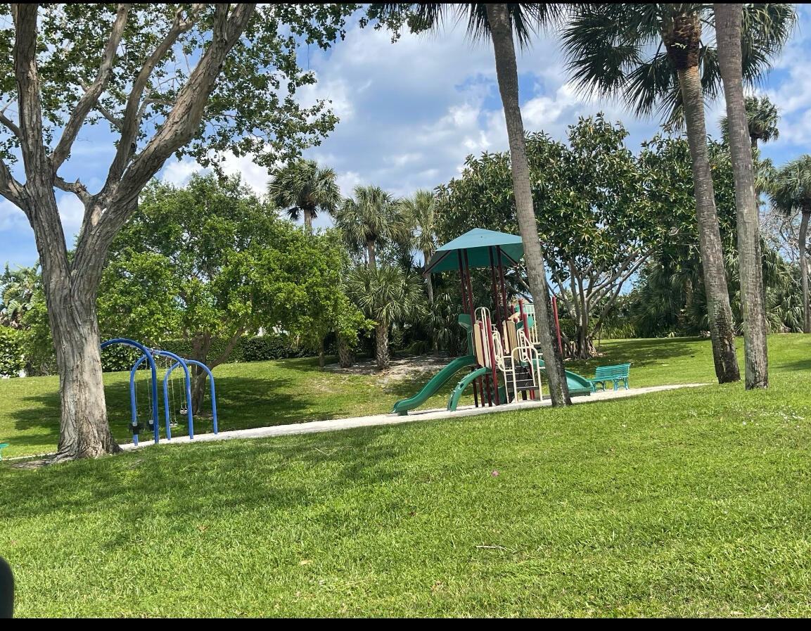 125 Cape Pointe Circle Jupiter, FL 33477 - Photo 43 of 45 a view of a park with a slide