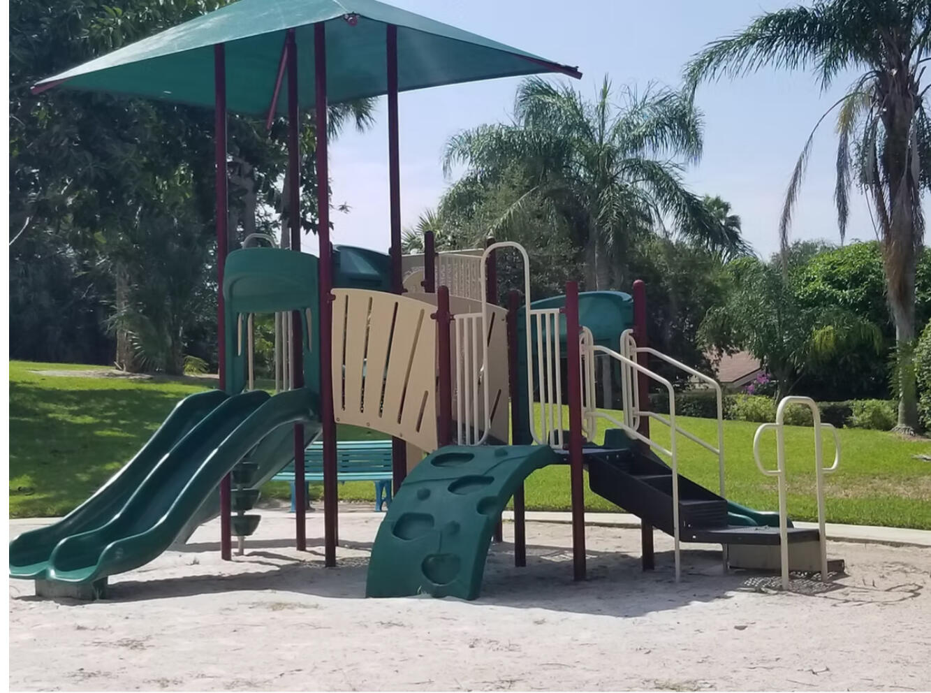 125 Cape Pointe Circle Jupiter, FL 33477 - Photo 44 of 45 an outdoor space with furniture and umbrella