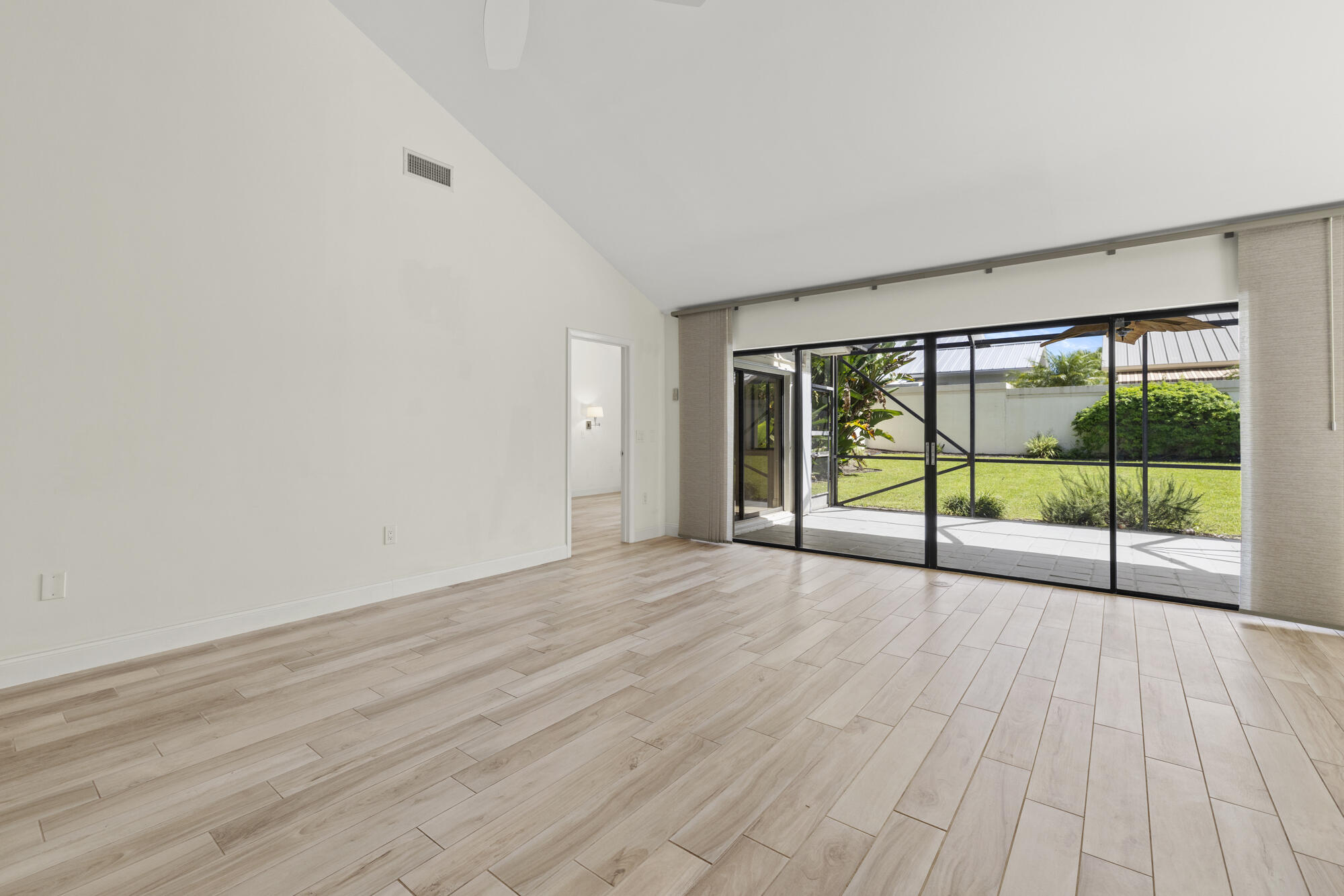 125 Cape Pointe Circle Jupiter, FL 33477 - Photo 45 of 45 wooden floor in an empty room with a window