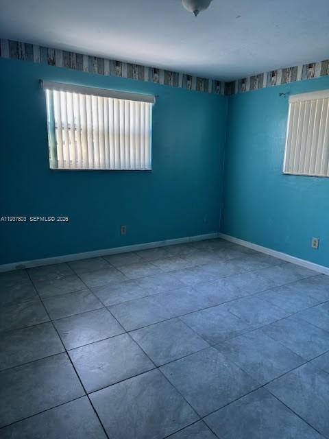 1804 Southwest 95th Terrace Miramar, FL 33025 - Photo 3 of 5 a view of an empty room with a window