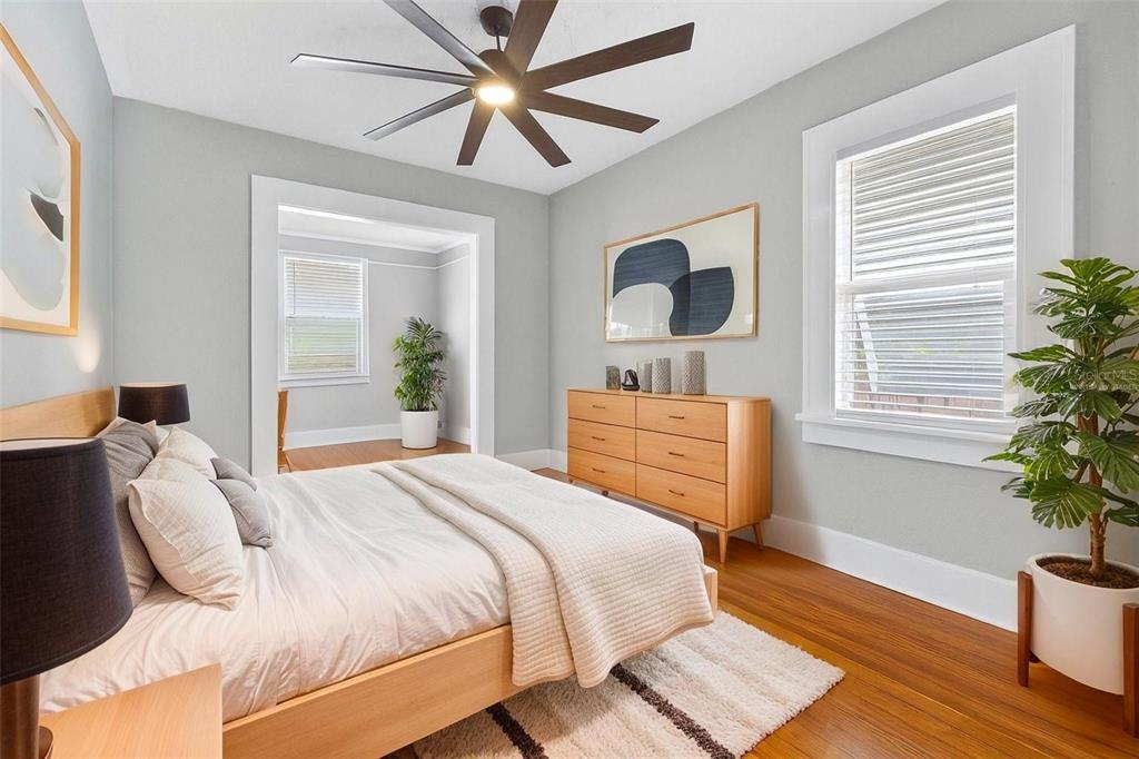 447 23rd Street North St. Petersburg, FL 33713 - Photo 18 of 28 a bedroom with a bed and wooden floor