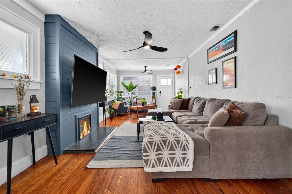 447 23rd Street North St. Petersburg, FL 33713 - Photo 9 of 28 a living room with furniture and a flat screen tv
