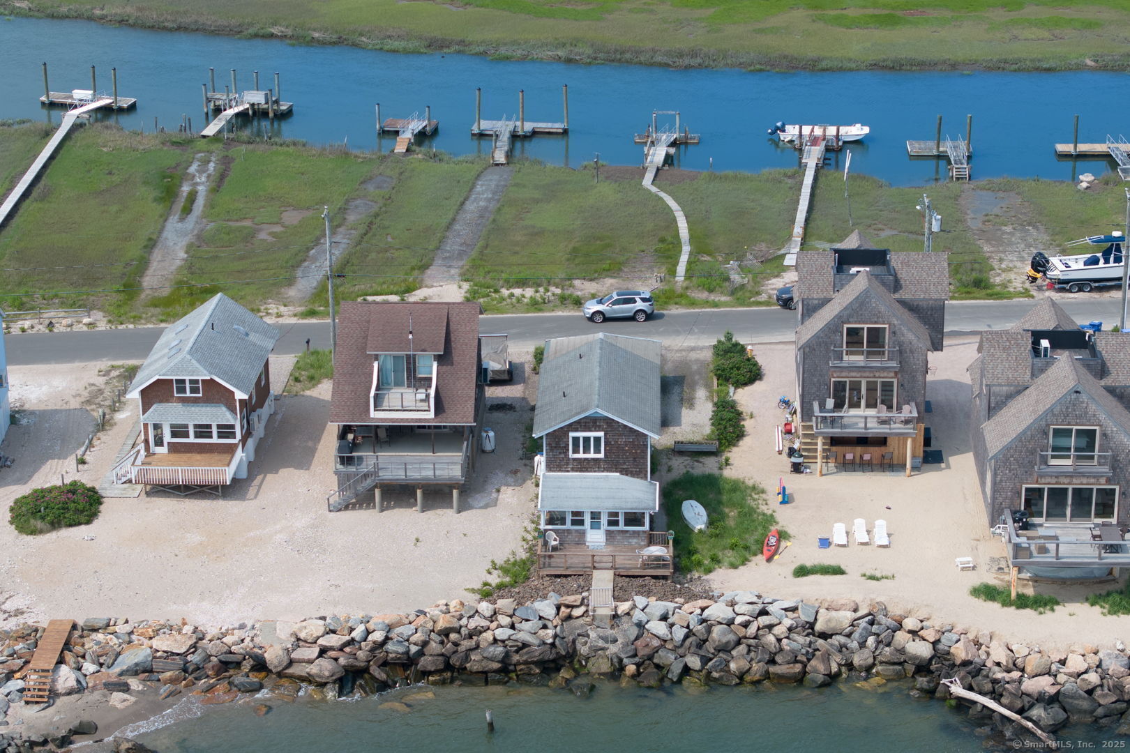 57 Circle Beach Road Madison, CT 06443 - Photo 1 of 1 an aerial view of a house with a garden