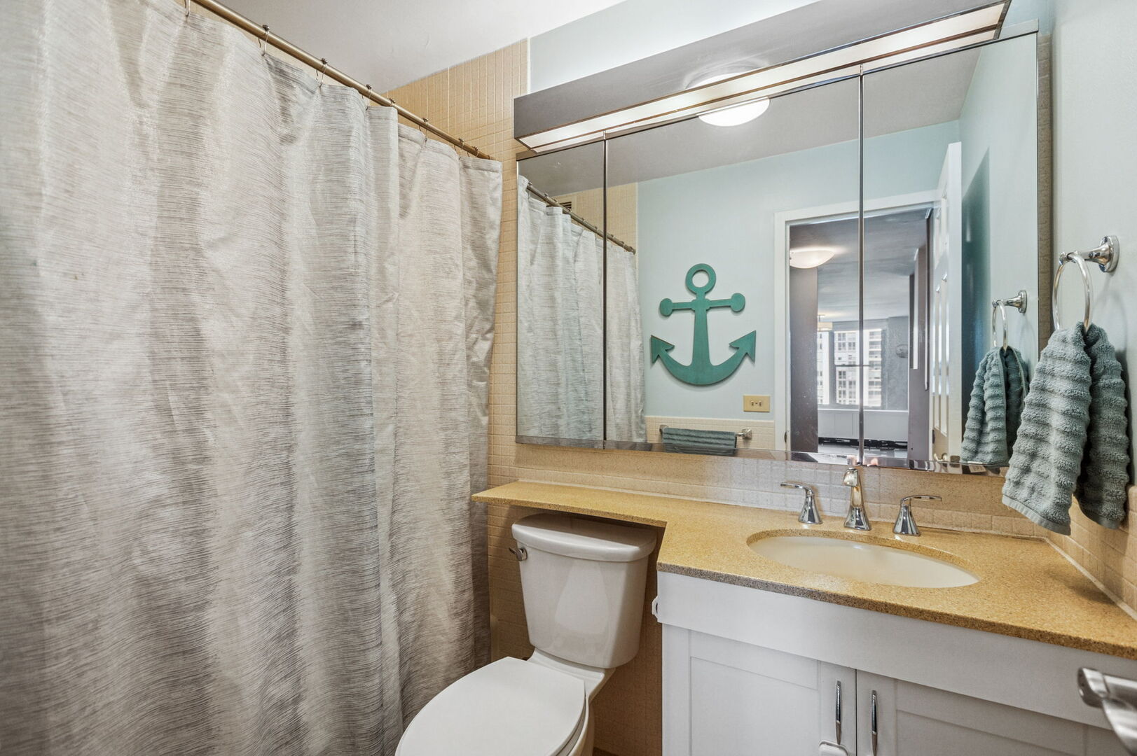 400 East Randolph Street, Unit 930 Chicago, IL 60601 - Photo 14 of 34 a bathroom with a granite countertop sink and a mirror