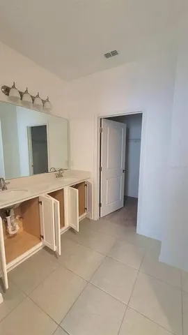 a view of empty room with windows