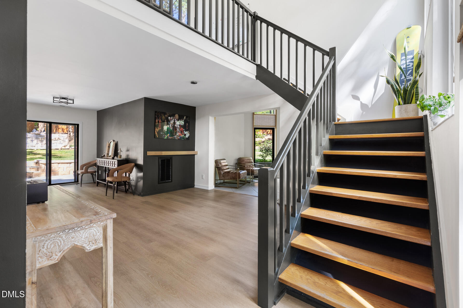 5208 Saddle Court Raleigh, NC 27609 - Photo 5 of 43 a view of entryway and hall with wooden floor