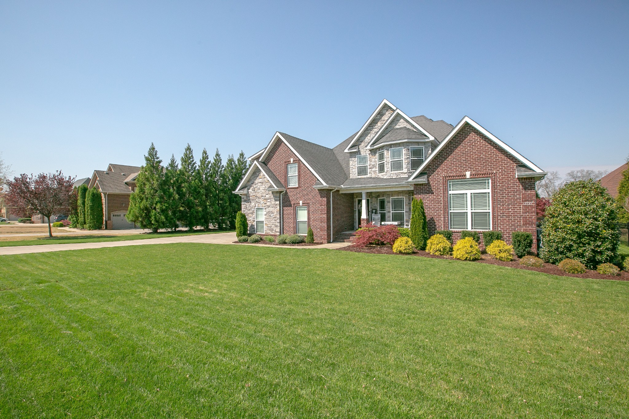 2727 Battleground Drive Murfreesboro, TN 37129 - Photo 2 of 31 a front view of a house with garden and porch