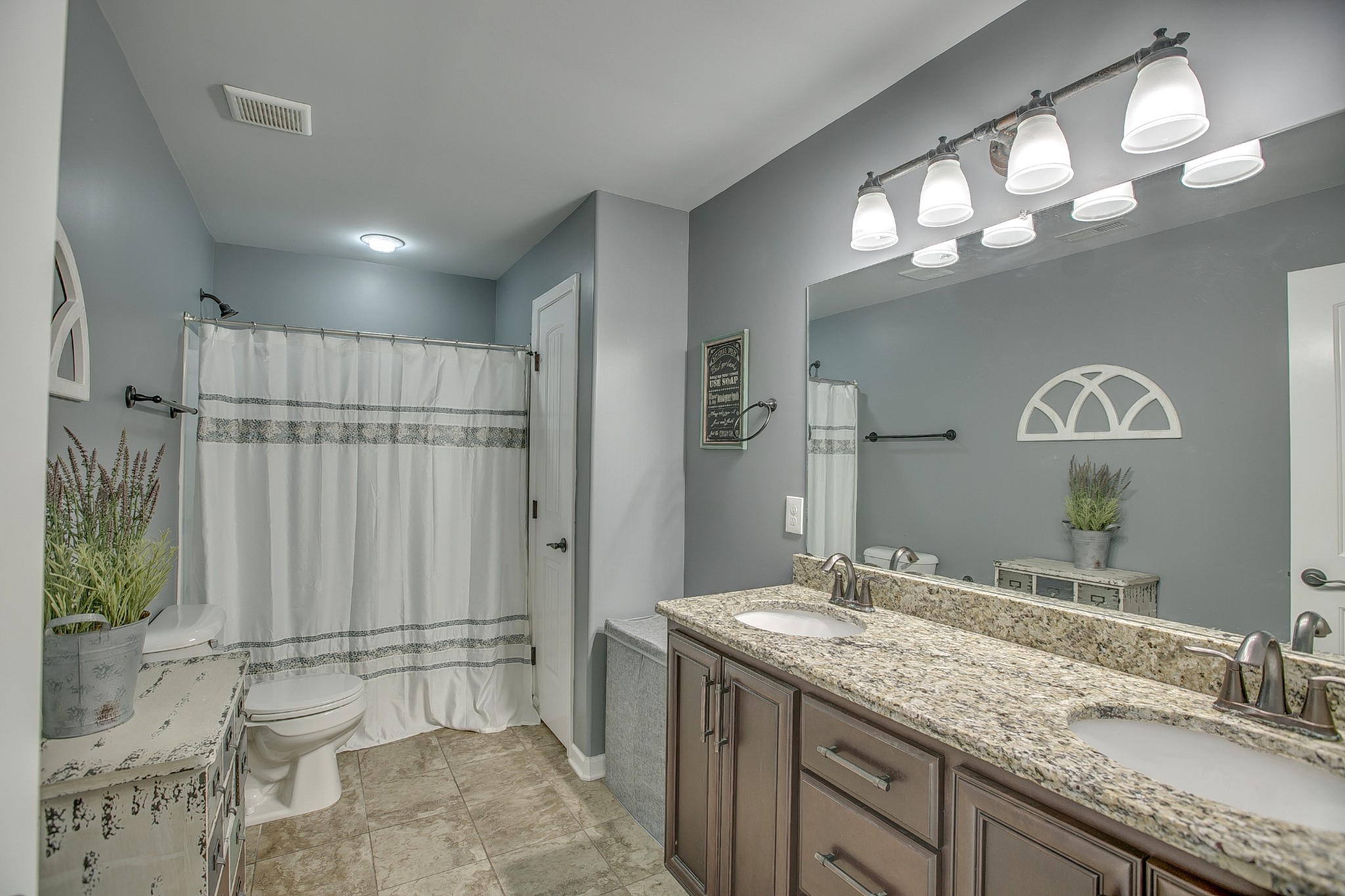 2727 Battleground Drive Murfreesboro, TN 37129 - Photo 26 of 31 a bathroom with a granite countertop sink a mirror and a shower