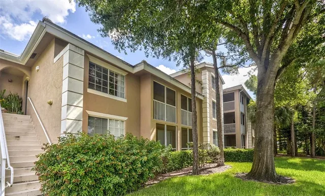 a front view of a multi story residential apartment buildings