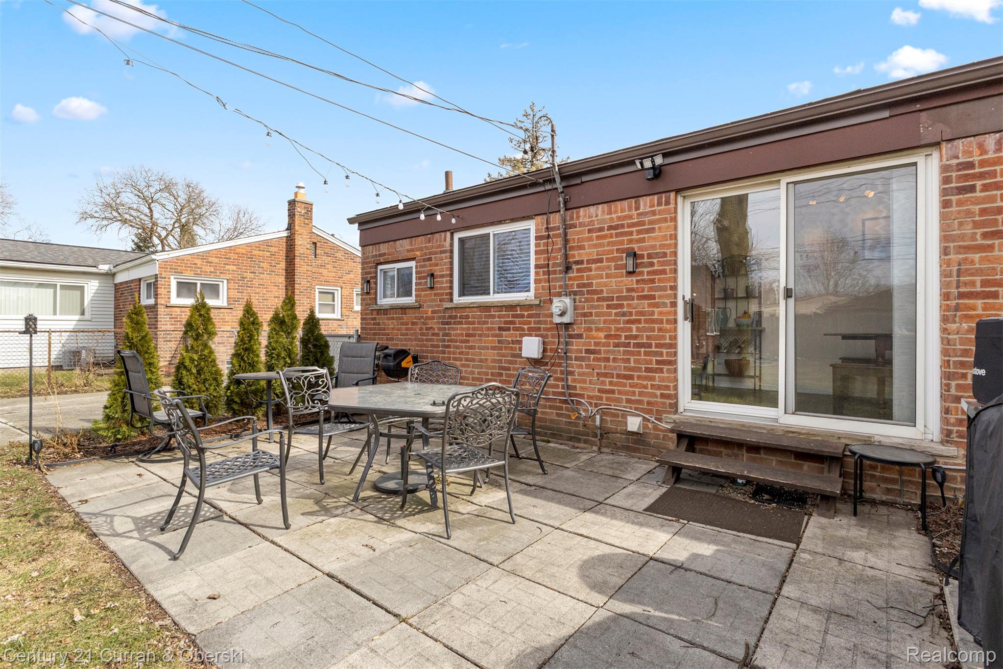 9329 Merriman Road Livonia, MI 48150 - Photo 25 of 32 View of patio featuring outdoor dining area