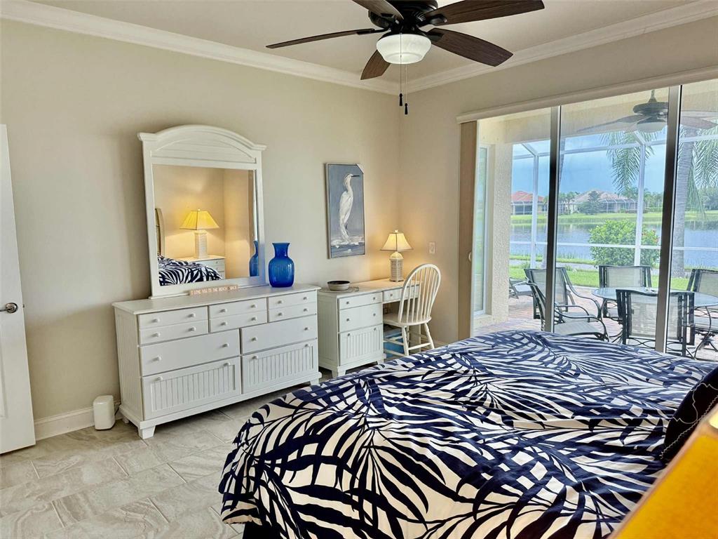 19240 Isadora Street Venice, FL 34293 - Photo 15 of 41 a bed room with a bed and a window