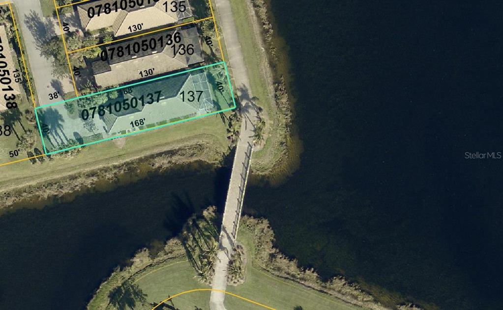 19240 Isadora Street Venice, FL 34293 - Photo 2 of 41 a balcony with table and chairs