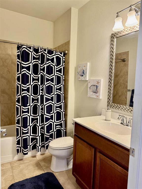 19240 Isadora Street Venice, FL 34293 - Photo 22 of 41 a bathroom with a sink a toilet and shower