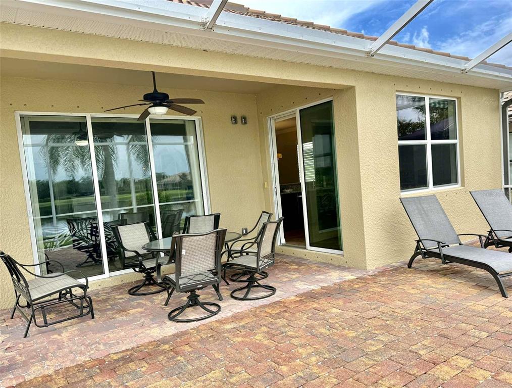 19240 Isadora Street Venice, FL 34293 - Photo 25 of 41 a view of a workspace with furniture and a window