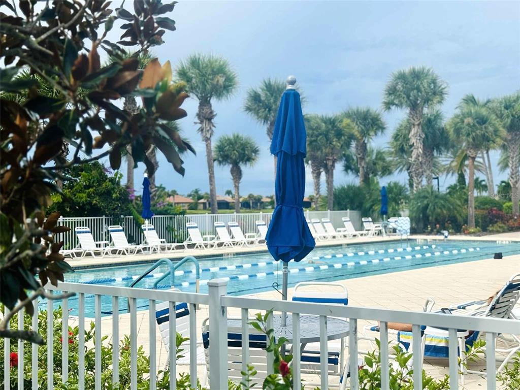 19240 Isadora Street Venice, FL 34293 - Photo 37 of 41 a view of lake with a patio and fire pit