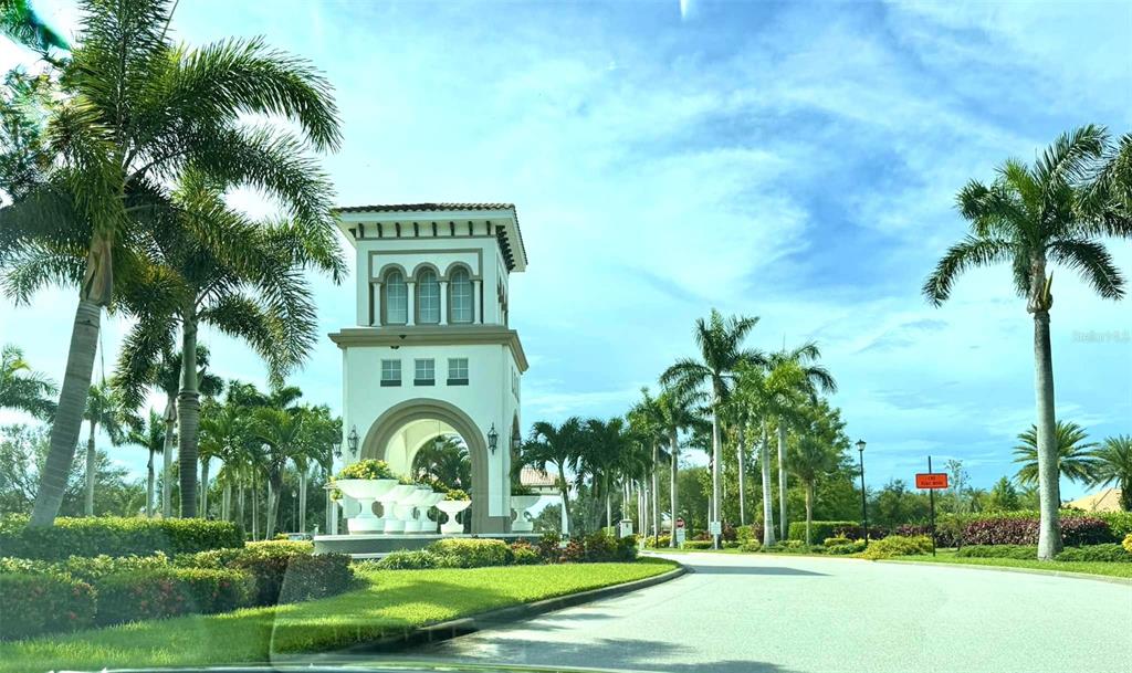19240 Isadora Street Venice, FL 34293 - Photo 40 of 41 a front view of a house with a garden