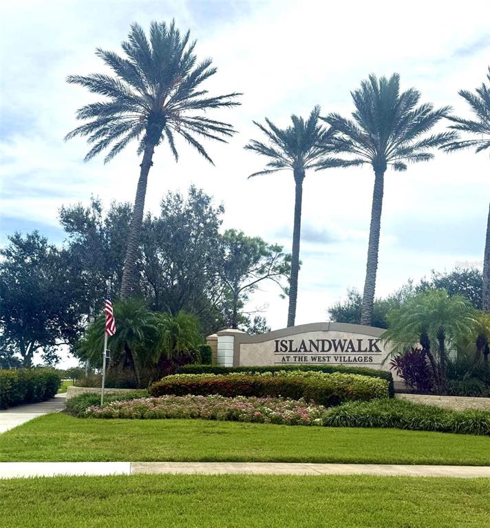 19240 Isadora Street Venice, FL 34293 - Photo 41 of 41 a view of swimming pool with a yard and palm trees