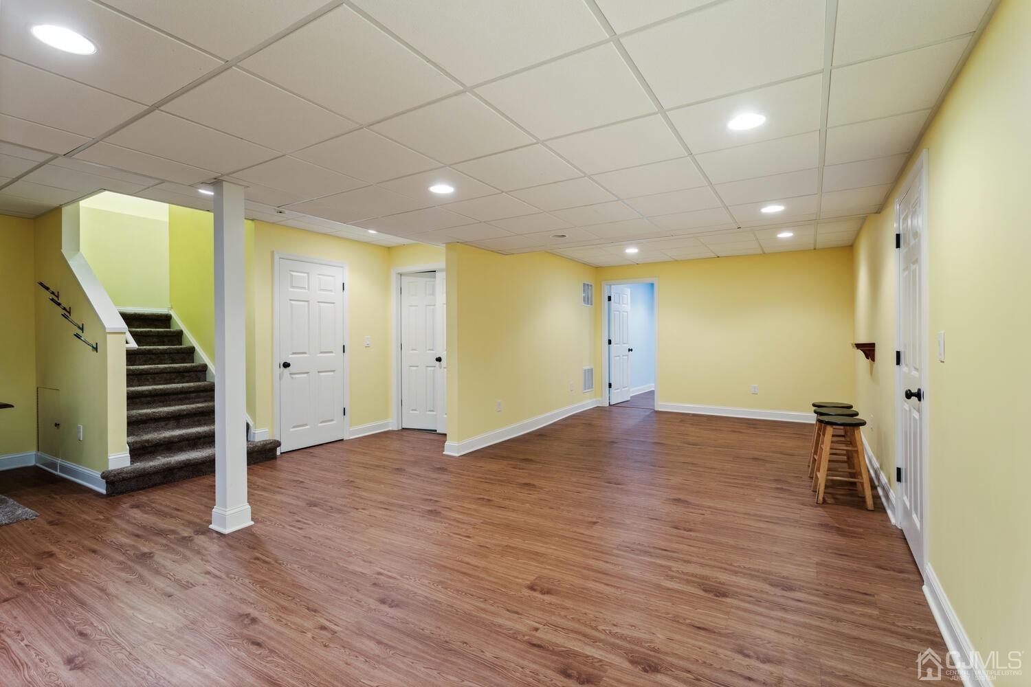 49 Brookside Road Millstone Township, NJ 08510 - Photo 41 of 60 a view of an empty room with wooden floor