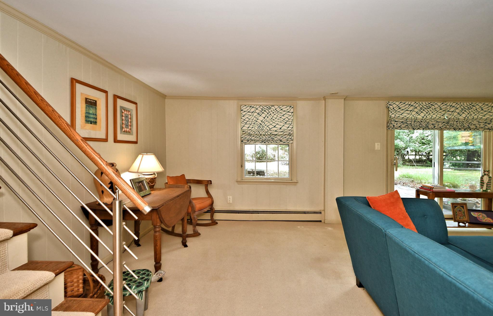 335 Powderhorn Road Fort Washington, PA 19034 - Photo 12 of 41 Great room on lower level with direct walk-out
