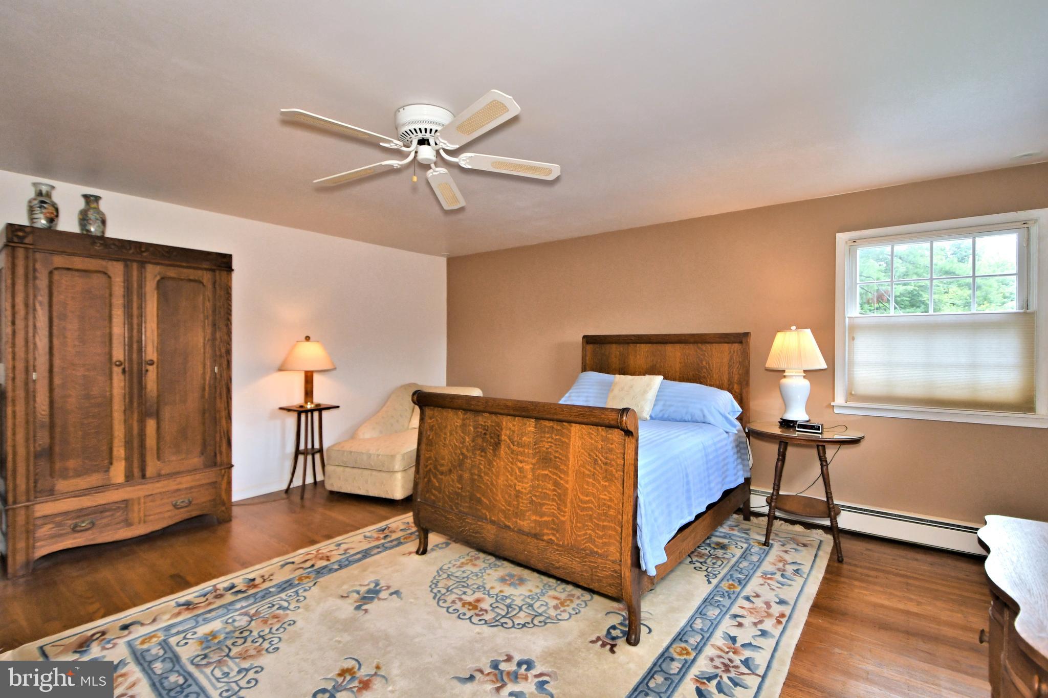 335 Powderhorn Road Fort Washington, PA 19034 - Photo 17 of 41 Primary bedroom with ceiling fan