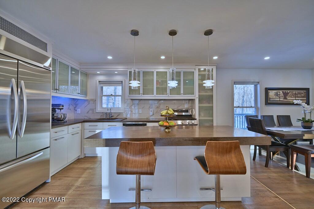 428 Big Oak Road Canadensis, PA 18325 - Photo 9 of 54 Center Island w/ Pendant Lighting