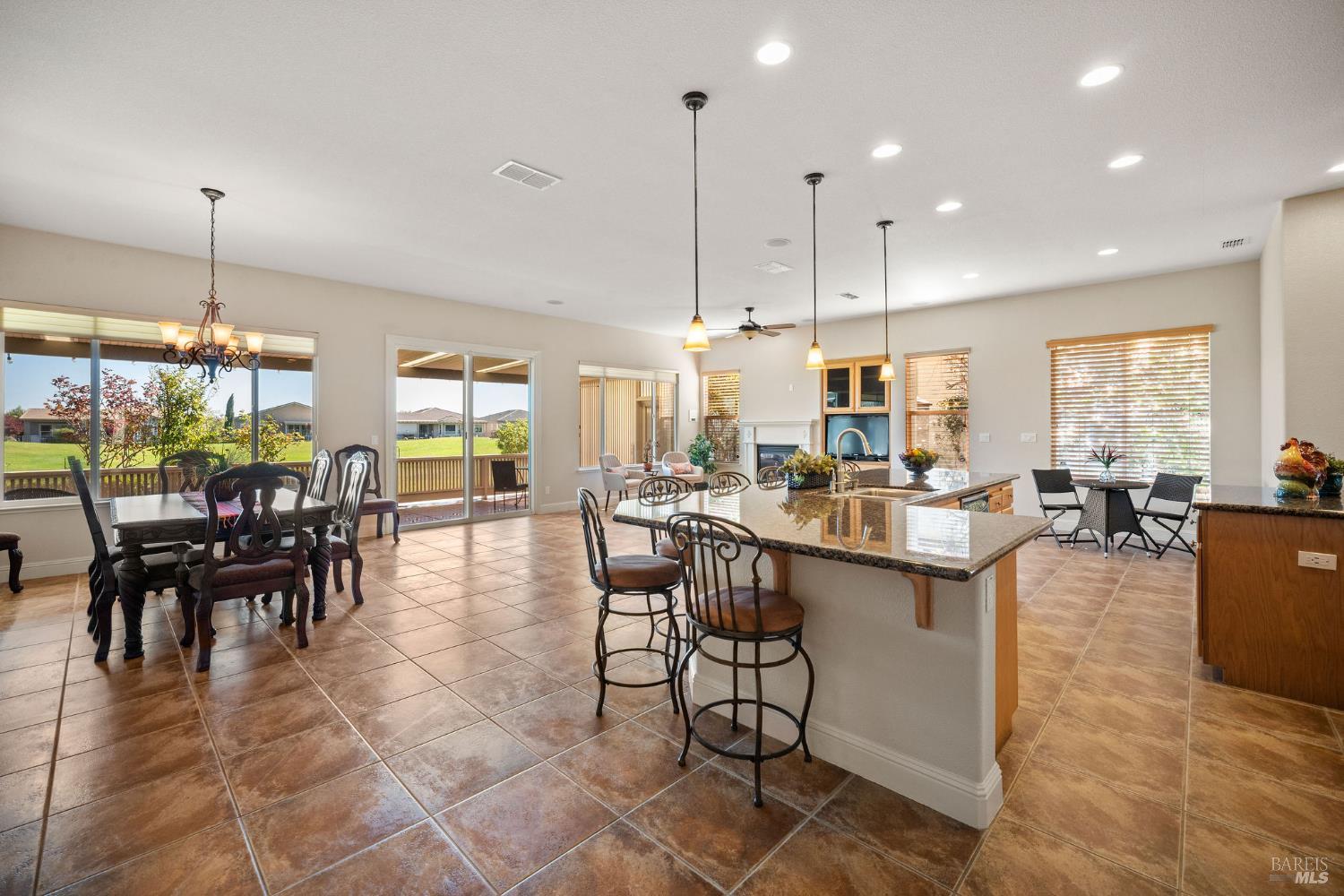 210 Magnolia Drive Rio Vista, CA 94571 - Photo 4 of 69 kitchen, living room, and dining room