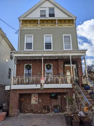 a front view of a building with balcony